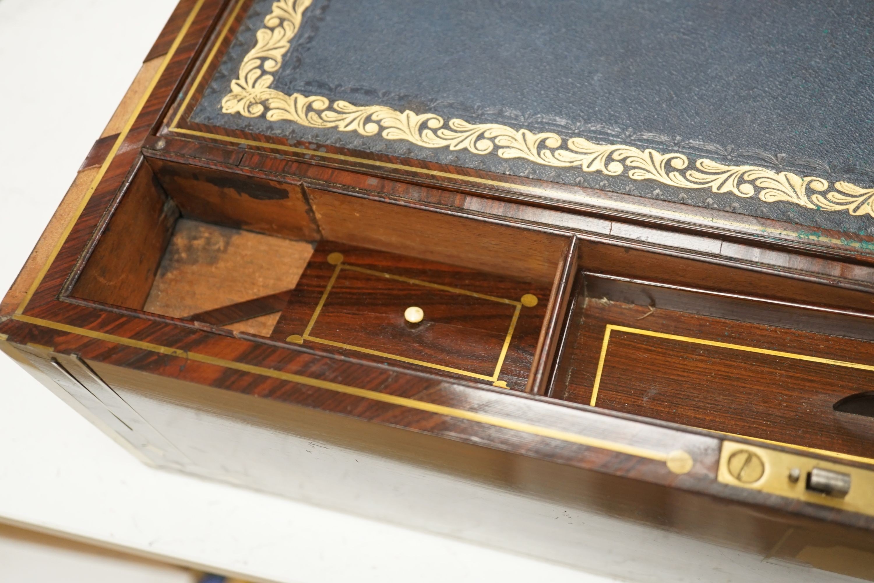A George IV brass bound kingwood writing slope, 52cm